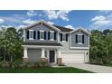 Charming two-story home with a two-car garage and beautiful curb appeal at 63 Horse Trot Ln, Sanford, NC 27332