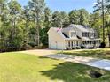 Beautiful two-story home featuring a two-car garage and a spacious front yard at 259 Sandpiper Dr, Sanford, NC 27332