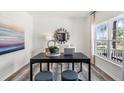 Bright office space with a large window, modern desk, and tasteful decor at 664 Wilder Bloom Path, Aberdeen, NC 27526
