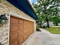 Spacious garage with paneled door at 75 Port Tack, Sanford, NC 27332