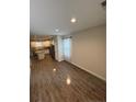 Bright and airy living room features hardwood floors and plenty of natural light at 4161 Overhills Rd, Spring Lake, NC 28390