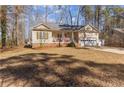 Attractive single-story home with a well-kept lawn and convenient attached garage at 7053 Maple Cir, Sanford, NC 27332