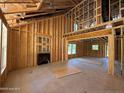 Spacious living room with wood framing, a fireplace, and lots of natural light at 235 Atkins Rd, Cameron, NC 28326