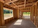 Interior framing shows construction of a new home with exposed studs at 275 Atkins Rd, Cameron, NC 28326