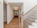 Bright entryway with wood floors, staircase, and double front doors at 134 Zion Church Rd, Sanford, NC 27332
