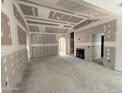 Unfinished living room with archway, fireplace, and rough-in electrical at 2 Foxfire Blvd, Cameron, NC 27281