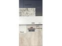 Showcasing design selections, featuring granite countertop, flooring, paint and cabinet samples at 215 Uwharrie Way, Sanford, NC 27330