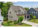Charming exterior of this home with well-maintained landscaping and inviting curb appeal at 405 Gilpin Way, Cary, NC 27519