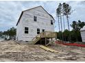 New construction home featuring a rear deck ready for your personal touches and customization at 41 Horse Trot Ln, Sanford, NC 27332