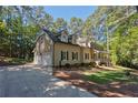 Lovely home showcasing the side facade, attached garage, and a neatly kept front yard at 3103 Royal Pines Dr, Sanford, NC 27330