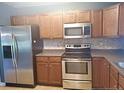 Fully equipped kitchen featuring stainless steel appliances, and ample storage at 1824 Ponderosa Trl, Cameron, NC 28326