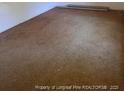 Spacious bedroom featuring neutral walls and carpeted flooring at 5028 Valley View Dr, Sanford, NC 27330