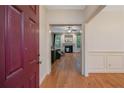 View from the front door showing hardwood floors and a living room with a fireplace at 98 Pineridge Cv, Sanford, NC 27332
