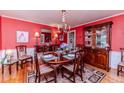 Elegant dining room with hardwood floors, decorative furnishings, and inviting atmosphere at 1409 Brentwood Pl, Sanford, NC 27330