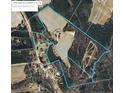 Aerial view of property showing large land plot outline, buildings, road, and surrounding properties at 2732 Leaflet Church Rd, Broadway, NC 27505
