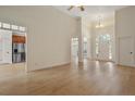 Open-concept floorplan with wood flooring, high ceilings, and lots of natural light at 196 Leaning Pine Cir, Spring Lake, NC 28390