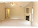 Spacious living room featuring carpet flooring, and a cozy fireplace at 168 Basket Oak Dr, Bunnlevel, NC 28323