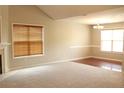Open-concept living room with ample natural light and neutral color palette at 168 Basket Oak Dr, Bunnlevel, NC 28323