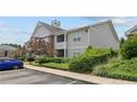 Exterior angle of apartment building showcasing well-kept landscaping and siding at 291 Gallery Dr # 104, Spring Lake, NC 28390