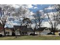 Expansive home featuring attached garage, mature trees, and well maintained lawn at 2847 Pickard Rd. Rd, Sanford, NC 27330