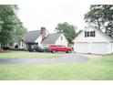 Sprawling home and garage with an expansive yard and circular driveway providing ample parking at 2847 Pickard Rd. Rd, Sanford, NC 27330