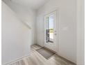 Bright entryway with wood-look floors and a view to the outside at 55 Fern Ridge Dr, Cameron, NC 28326