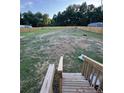 Large backyard with a new wooden fence at 92 Rad St, Lillington, NC 27546