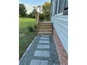 Brick-lined path up to a wood porch at 92 Rad St, Lillington, NC 27546