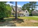 Charming home with covered front porch and an attached two-car garage at 120 Timberwood Dr, Carthage, NC 28326