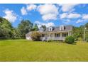 Charming home featuring a welcoming front porch and a spacious two-car garage at 1862 Nc 87 S, Cameron, NC 28326