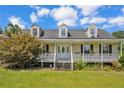 This home has an amazing front porch perfect for enjoying your free time at 1862 Nc 87 S, Cameron, NC 28326