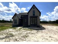 New two-story home featuring a modern design and neutral color palette at 4905 Hidden Pasture Way, Zebulon, NC 27597
