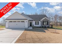 Move-in ready ranch home with white siding, stone accents, and a two-car garage at 177 Ruskin Dr, Smithfield, NC 27577