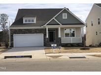 Newly constructed craftsman style home with stone and siding accents at 500 Glenwyck Ct, Fuquay Varina, NC 27526