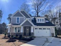 Charming two-story home featuring a two-car garage and craftsman details at 3113 Petrea Ct # 38, Angier, NC 27501