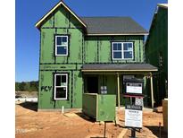 New construction home featuring ZIP System sheathing and a modern roof design at 2412 Adrift Road, Fuquay Varina, NC 27526