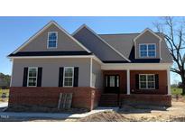 Charming two-story home with brick and gray siding at 1681 S Old Carriage Rd, Rocky Mount, NC 27804