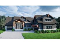 Modern farmhouse exterior with dark siding, stone accents, and a large covered porch at 143 High Ridge Ln, Pittsboro, NC 27312