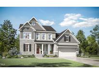 Charming two-story home featuring stone accents, a welcoming front porch, and a well-manicured lawn at 274 Golden Leaf Farms Rd, Angier, NC 27501