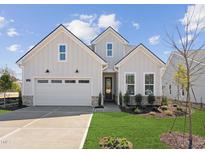 Charming single-Gathering home with a well-manicured lawn and a two-car garage, perfect for suburban living at 624 Gainer Dr # 17, Raleigh, NC 27610
