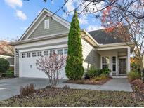 Charming single-Gathering home with attached two-car garage and well-maintained landscaping at 117 Rosedale Creek Dr, Durham, NC 27703