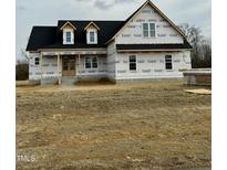 Newly constructed craftsman style home with a wrap around porch at 5601 River Buck Rd, Spring Hope, NC 27882