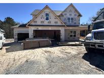 New two-story home under construction, showcasing its framework and design at 106 Roma Gora Ct, Princeton, NC 27569