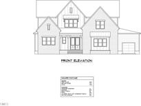 Charming front elevation of a two-story home featuring a covered porch and symmetrical design at 4345 Coldwater Springs Dr, Raleigh, NC 27616