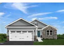 Two-story house with gray siding, stone accents, and a two-car garage at 600 Mathiola Dr, Wendell, NC 27591