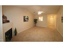 Spacious living room featuring a fireplace and vaulted ceiling at 2410 Huntscroft Ln # 203, Raleigh, NC 27617