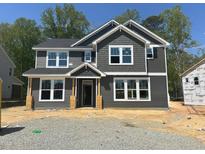 Two-story home featuring gray siding, white trim, and a covered front porch at 1901 Old Bramble Ln # 3, Fuquay Varina, NC 27526