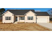 Newly built single-story house with neutral siding and a two-car garage at 52 Roll Tide Ct, Angier, NC 27501