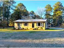 Charming single-story home with a well-maintained front yard and mature trees in a quiet neighborhood at 2253 Nc Highway 96 S, Franklinton, NC 27525