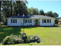 Charming ranch home with well-manicured lawn at 1309 Eastern Avenue Ave, Rocky Mount, NC 27801